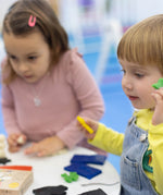 Children moulding their own creations from the Medenka beeswax modelling clay. 