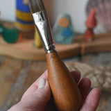 Mercurius flat head paintbrush with wooden egg shaped handle for children.