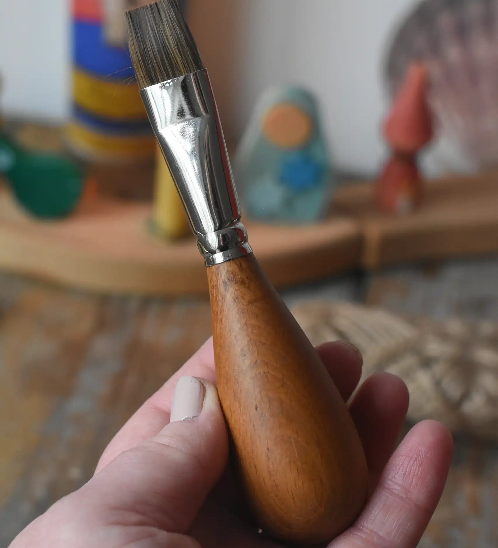 Mercurius flat head paintbrush with wooden egg shaped handle for children.