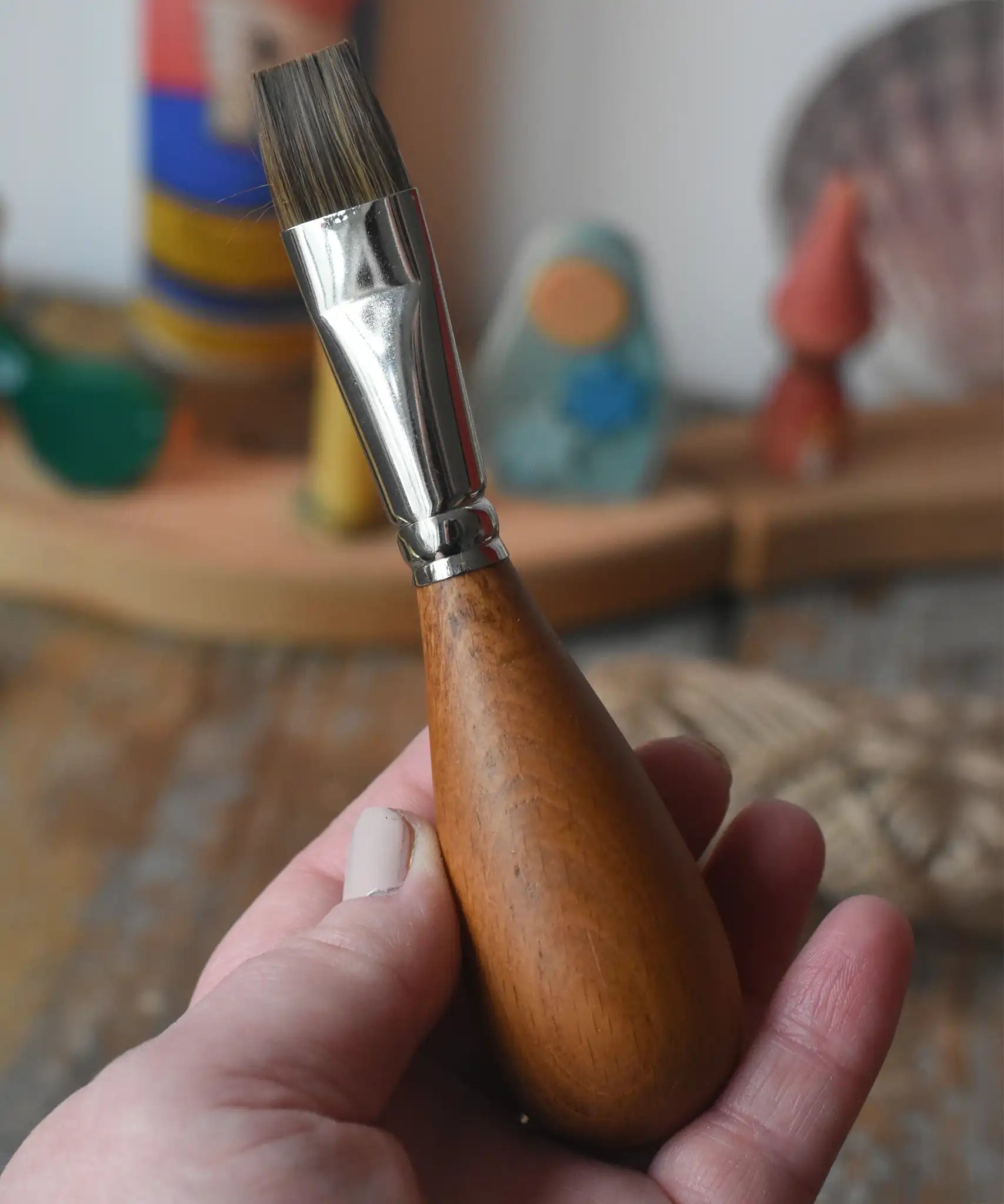 Mercurius flat head paintbrush with wooden egg shaped handle for children.