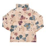 Meyadey kid's organic cotton long sleeve turtle neck top in the Tropical Orchid print on a white background