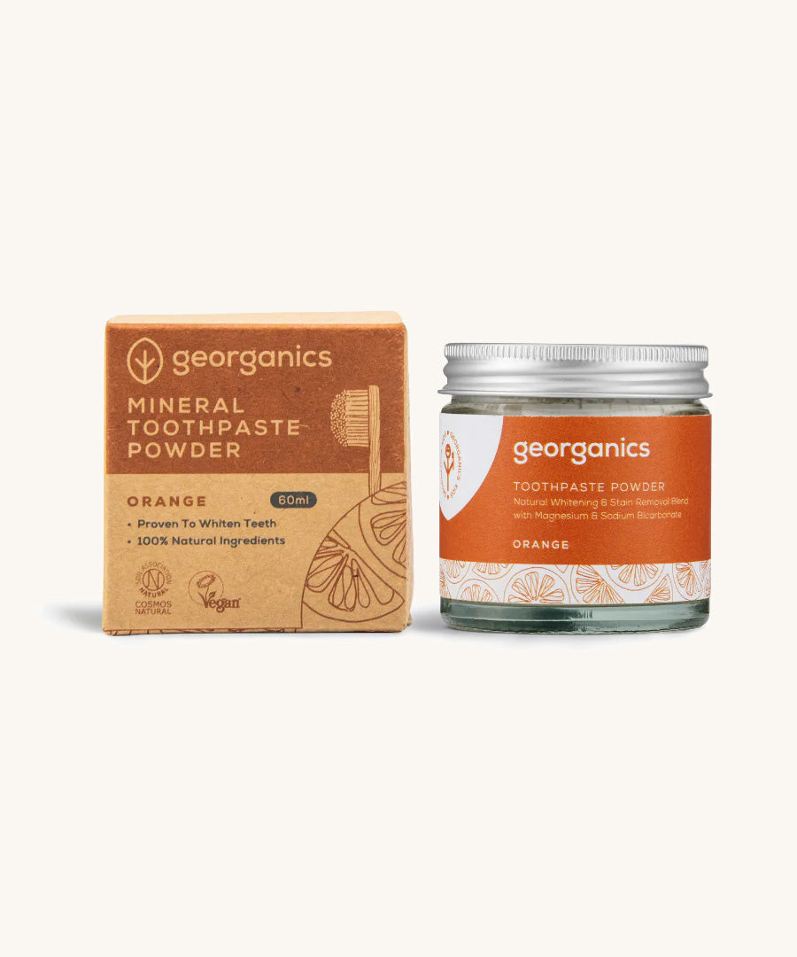 A jar of the orange Georganics toothpaste powder with the box