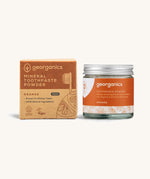  A jar of the orange Georganics toothpaste powder with the box