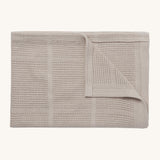 MORI cellular blanket in biscuit. A 100% organic fabric blanket in a neutral colour with air hole to keep cool and warm on colder days. 