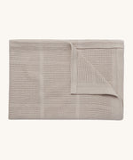 MORI cellular blanket in biscuit. A 100% organic fabric blanket in a neutral colour with air hole to keep cool and warm on colder days. 