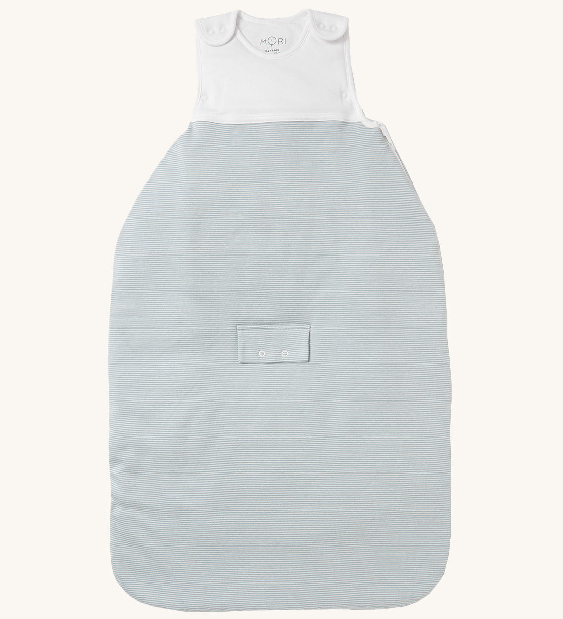 MORI baby sleeping bag in 2.5 TOG. A jersey style baby organic cotton and bamboo sleeping bag in blue and white stripe design. Features a small pocket on the front and popper fasteners on the shoulders for easy fitting.
