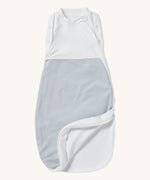MORI baby swaddle bag. 100% organic bamboo and cotton swaddle in blue and white stripes. Features poppers by the arms and neck for easy fitting and a zip down the side and bottom for easy changing