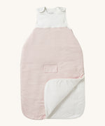 MORI baby sleeping bag in 1.5 TOG. A jersey style baby sleeping bag in white and pink stripe design on organic fabric. showing the zip up feature open for easy changing