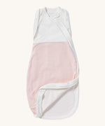 MORI baby swaddle bag. 100% organic bamboo and cotton swaddle in pink and white stripes. Features poppers by the arms and neck for easy fitting and a zip down the side and bottom for easy changing
