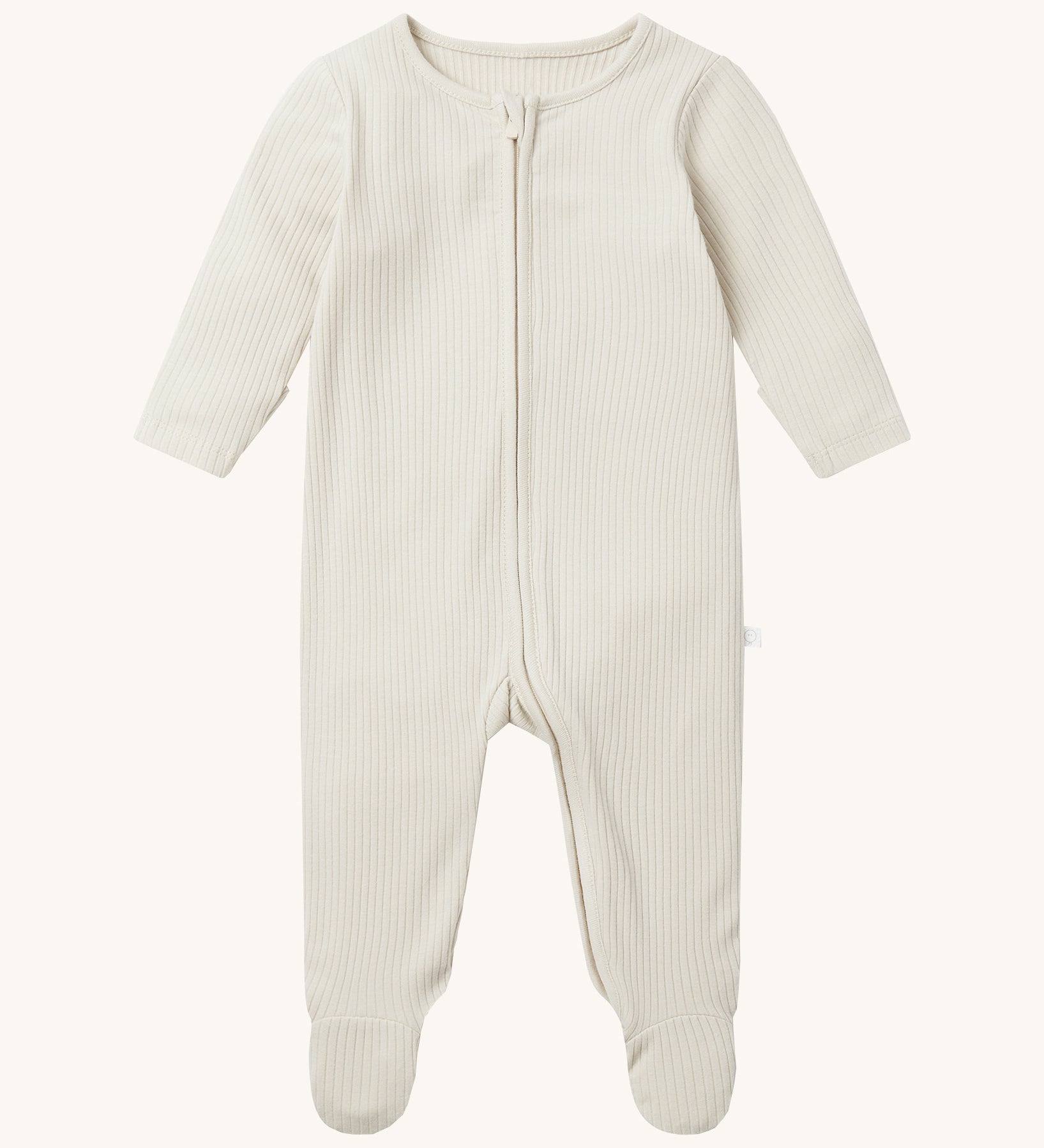 Mori two way zipped sleepsuit in ecru colour. A ribbed style all in one outfit made from bamboo and organic cotton. Features a two-way zip and concealed for safety