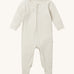 Mori two way zipped sleepsuit in ecru colour. A ribbed style all in one outfit made from bamboo and organic cotton. Features a two-way zip and concealed for safety