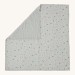 MORI muslin square in grey laid out flat showing the cute little prints of clouds and creatures in dark grey on organic cotton fabric