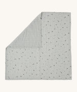 MORI muslin square in grey laid out flat showing the cute little prints of clouds and creatures in dark grey on organic cotton fabric