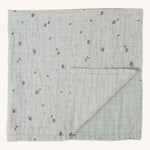 MORI muslin square in grey. 100% organic cotton muslin with cute little prints of clouds and creatures in dark grey