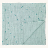 MORI muslin square in mint. 100% organic cotton muslin in light green with cute little prints of clouds and creatures in darker green