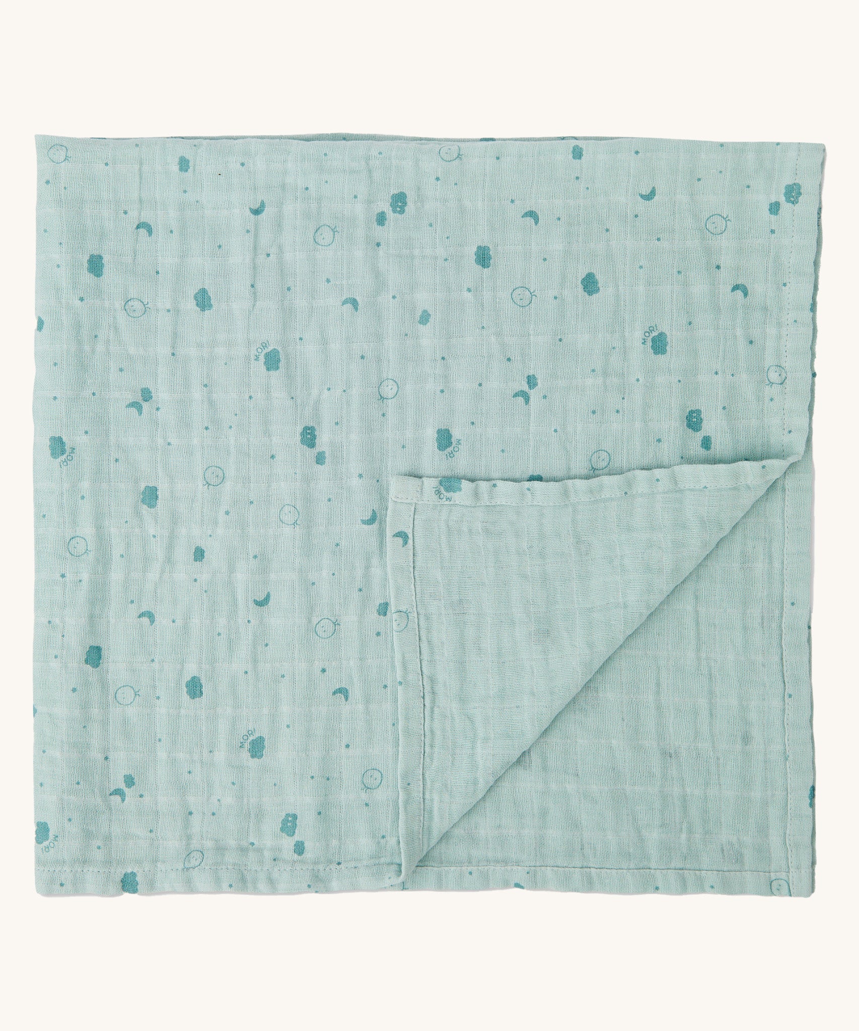 MORI muslin square in mint. 100% organic cotton muslin in light green with cute little prints of clouds and creatures in darker green