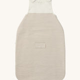 MORI baby sleeping bag in 1.5 TOG. A jersey style baby organic cotton and bamboo sleeping bag in white and neutral stripe design. Features a small pocket on the front and popper fasteners on the shoulders for easy fitting.