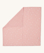 MORI muslin square in pink laid out flat showing the cute little prints of clouds and creatures in white on organic cotton fabric