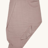 MORI cellular blanket in rose laid out showing the air hole detail on organic fabric. 