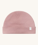 MORI hat in rose. A light pink ribbed style beanie made from bamboo and organic cotton. Features an soft turn up brim
