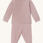 MORI pyjamas in rose. A light pink ribbed style pyjama set made from bamboo and organic cotton. Features a popper fastener top for easy fitting and elasticated cuffs on the arms and legs for a comfortable fit