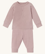 MORI pyjamas in rose. A light pink ribbed style pyjama set made from bamboo and organic cotton. Features a popper fastener top for easy fitting and elasticated cuffs on the arms and legs for a comfortable fit
