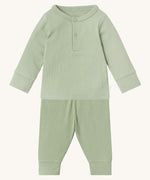 MORI pyjamas in sage. A light green ribbed style pyjama set made from bamboo and organic cotton. Features a popper fastener top for easy fitting and elasticated cuffs on the arms and legs for a comfortable fit
