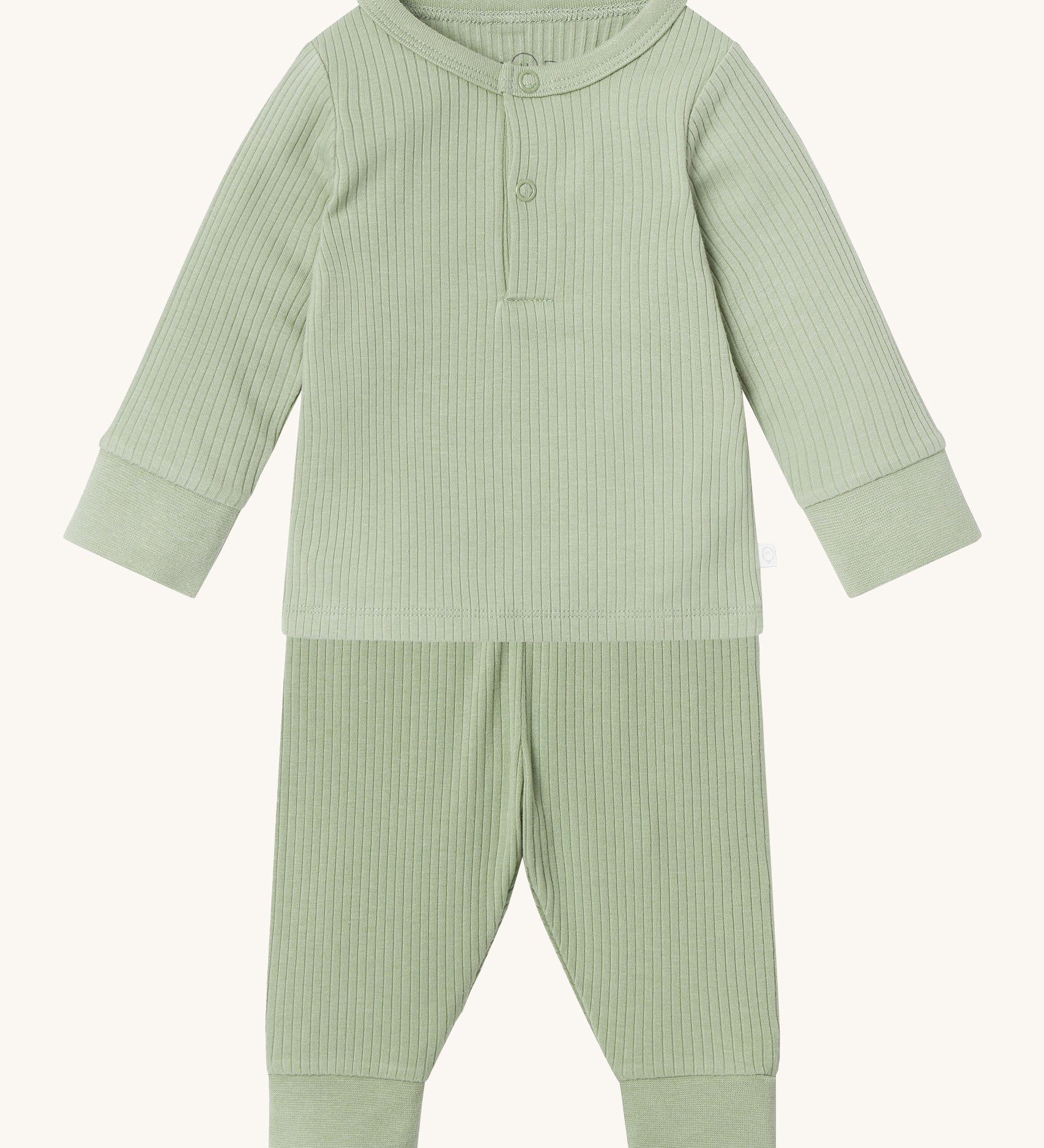 MORI pyjamas in sage. A light green ribbed style pyjama set made from bamboo and organic cotton. Features a popper fastener top for easy fitting and elasticated cuffs on the arms and legs for a comfortable fit