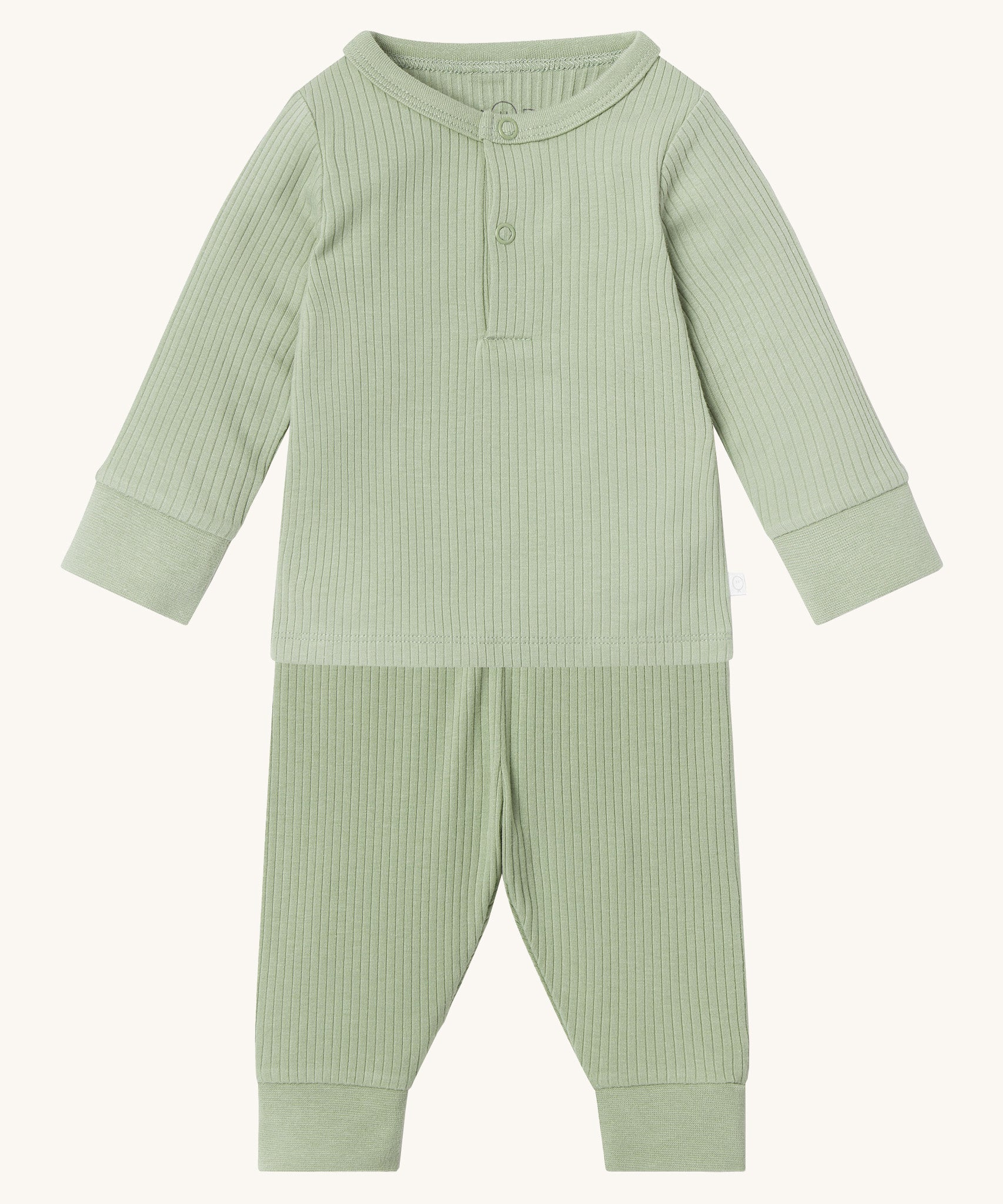 MORI pyjamas in sage. A light green ribbed style pyjama set made from bamboo and organic cotton. Features a popper fastener top for easy fitting and elasticated cuffs on the arms and legs for a comfortable fit