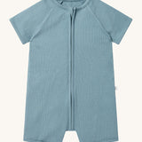 MORI Summer sleepsuit in sky blue. A ribbed style all in one outfit with short sleeves and leg made from bamboo and organic cotton. Features a full length zip for easy fitting