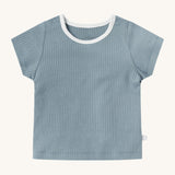 MORI short sleeve t-shirt in sage green. A ribbed style short sleeve top made from bamboo and organic cotton. Features poppers at the shoulder for easy fitting and a white neck trim