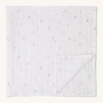 MORI muslin square in white. 100% organic cotton muslin with cute little prints of clouds and creatures in light grey