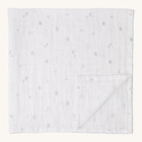 MORI muslin square in white. 100% organic cotton muslin with cute little prints of clouds and creatures in light grey