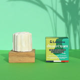 A person holding the Lamazuna Nourishing Dream Cream Bar and box on the palm of their hand