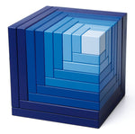 Naef blue cella stacking cube toy on a white background