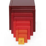 Naef's Cella cube toy stretched out forwards towards the camera