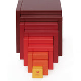 Naef's Cella cube toy stretched out forwards towards the camera
