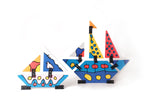 Naef Art Uris kit built up into two boats on a white background