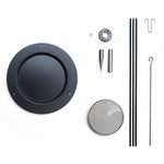 The individual parts of the Naef sand pendulum decorative physics toy, disassembled.