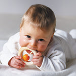 Baby playing with Kauring baby teether