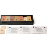 Naef premium wooden block set in its collector box on a white background