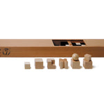 Pieces from the Naef eco-friendly wooden chess pieces set in front of their wooden storage box on a white background