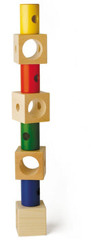 Naef Signa wooden threading toy stacked on a white background in an intermittent pattern.