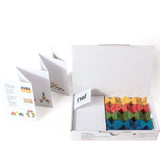 Open box of the Naef Spiel Mini precision wooden toy showing colourful interlocking cubes, booklet, and Naef logo. German made wooden puzzle and stacking game for adults and children.