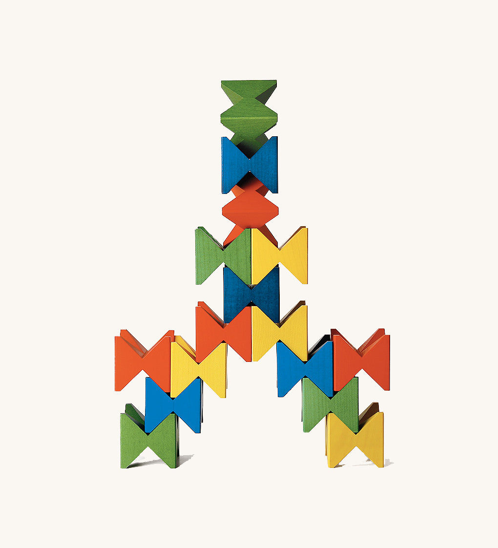 Creative geometric pattern built from Naef Spiel Mini coloured wooden cubes. Precision handcrafted German wooden stacking toy and puzzle for all ages.