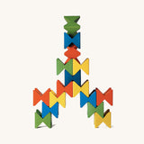 Creative geometric pattern built from Naef Spiel Mini coloured wooden cubes. Precision handcrafted German wooden stacking toy and puzzle for all ages.