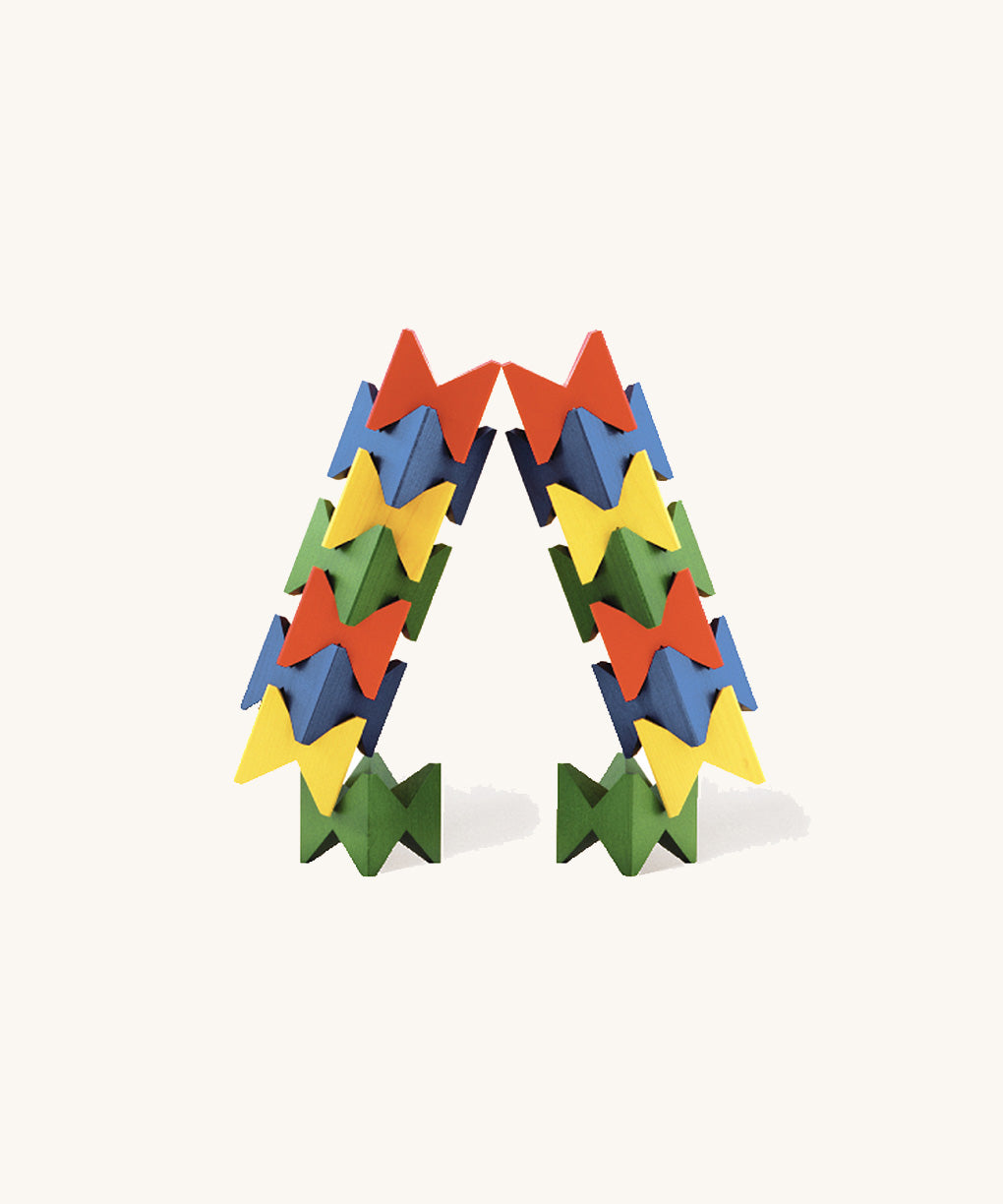 Naef Spiel Mini construction in bright primary colours forming an arch shape. High quality precision wooden stacking game handcrafted in Germany.