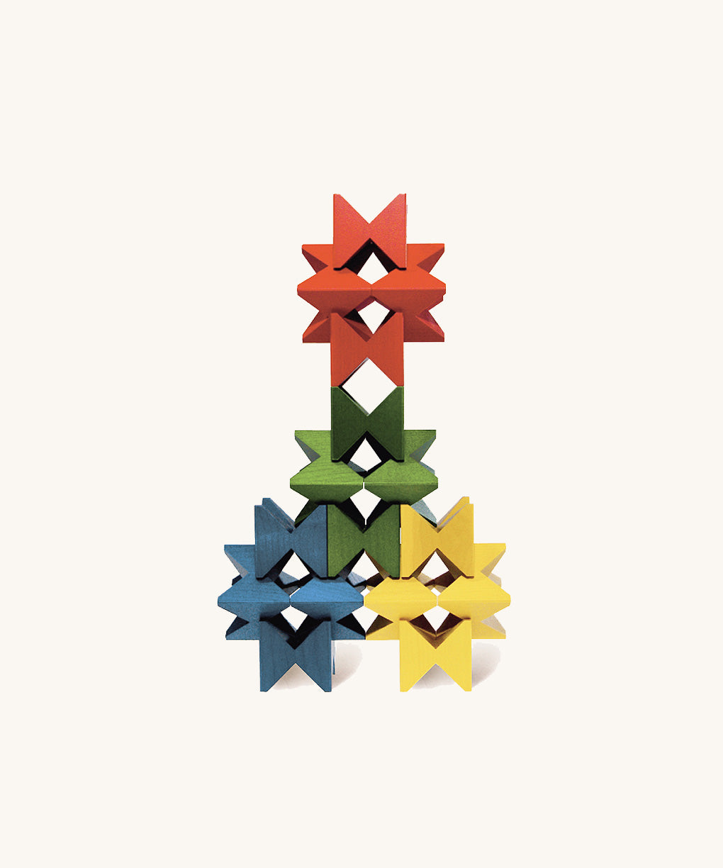 Creative geometric pattern built from Naef Spiel Mini coloured wooden cubes. Precision handcrafted German wooden stacking toy and puzzle for all ages.