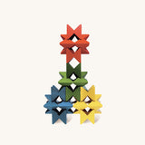 Creative geometric pattern built from Naef Spiel Mini coloured wooden cubes. Precision handcrafted German wooden stacking toy and puzzle for all ages.