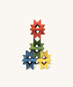 Creative geometric pattern built from Naef Spiel Mini coloured wooden cubes. Precision handcrafted German wooden stacking toy and puzzle for all ages.